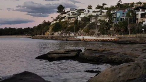 Slow motion dolly wealthy suburb next to Sydneys Shelly Beach 4K Video stock 247462852