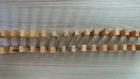Slow motion domino effect strategy and planning Stock Footage 103992116