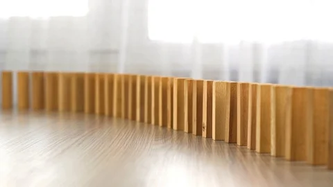 Slow motion domino effect strategy and planning Stock Footage 103992231