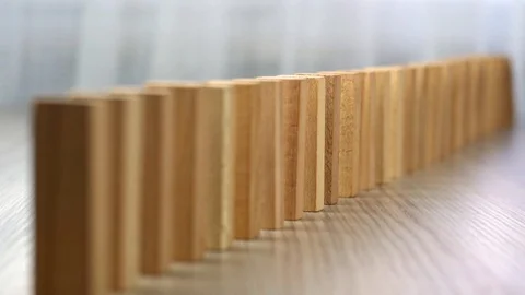 Slow motion domino effect strategy and planning Stock Footage 103992302