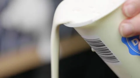 Slow Motion Double Cream Stock Footage 166863070