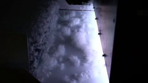 Slow motion of the down filling machines selecting down with sensors, s.. Видео 72640814
