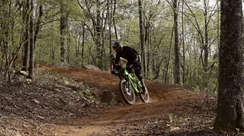 Slow motion downhill mountain biking 3 Stock Footage 52063772