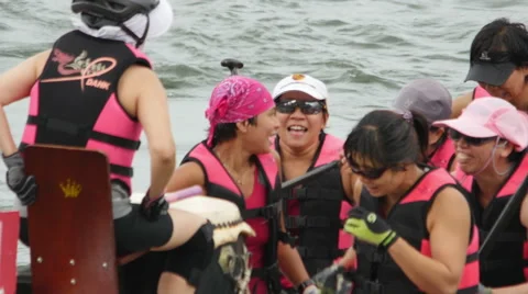 Slow Motion Dragon Boat Race winning team Stock Footage