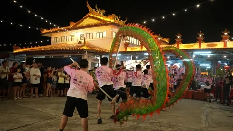 Slow Motion Dragon Dance Performance at Kampar Seng Fatt Temple Stock Footage 345438190