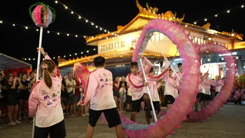 Slow Motion Dragon Dance Performance at Kampar Seng Fatt Temple Stock Footage 345438245