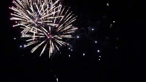 Slow Motion Drifting Fireworks Stock Footage 115957090