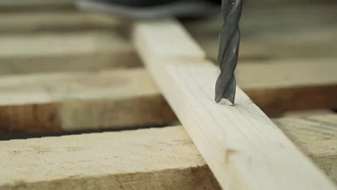 Slow motion drilling of wood in a workshop Stock Footage 73153050