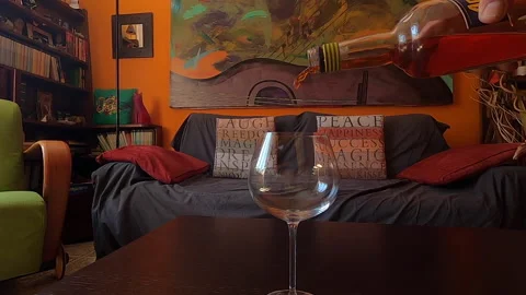 Slow motion of a drink served at home in a goblet glass Stock Footage 138098735
