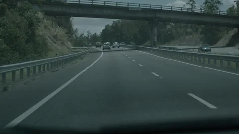 Slow Motion Drive on Highway Under Overpass in Sunshine Coast, Queensland, Austr Stock Footage 341313509