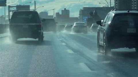 Slow motion driving in the rain Stock Footage 117998899