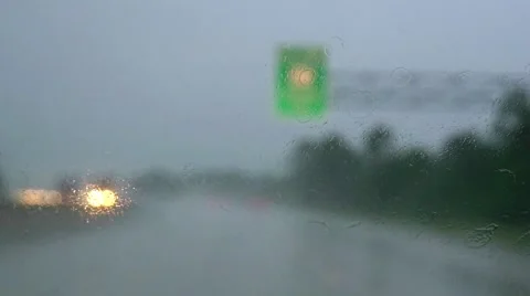 Slow motion driving on rainy U.S. highway Stock Footage 54919019