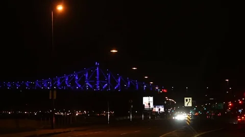 Slow motion driving shot on rue Notre-Dame looking at Jacques Cartier Bridge! Stock Footage 83527880