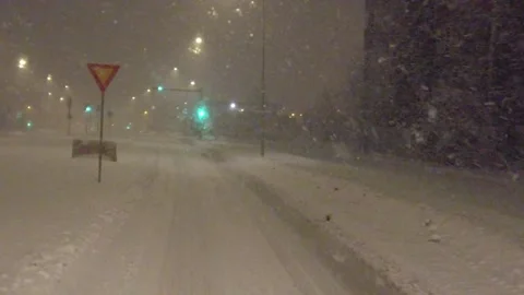 Slow-motion driving in snow blizzard Stock Footage 168146469