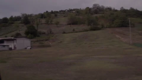 Slow motion driving through Oltrepò Pavese vineyards, car view. Stock Footage 345338961