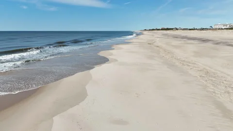Slow-Motion Drone Dolly Along a Calm Beach Stock Footage 272225180