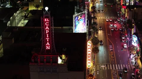 Slow motion drone footage of the El Capitan Theater building sign Stock Footage 295131471