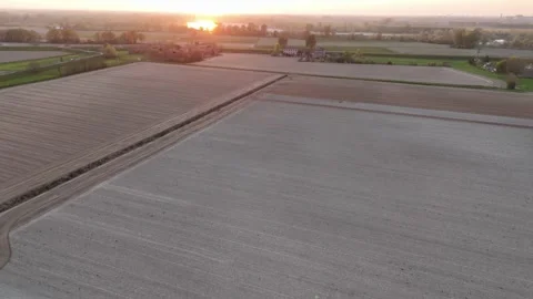 Slow-motion drone pan over pre-seeded fields near Olza di Castelvetro Video stock 308444482