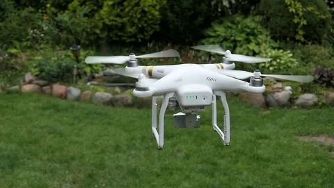 Slow Motion Drone Quadcopter Hovering In The Air Stock Footage 80533347