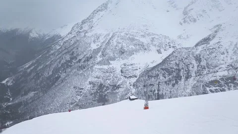 Slow motion. Drone shooting. Top view of the ski slope of the mountain resort Stock Footage 166092870