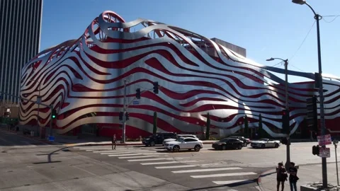 Slow motion drone shot. Petersen Automotive Museum. Los Angeles. California  Stock Footage 131491754