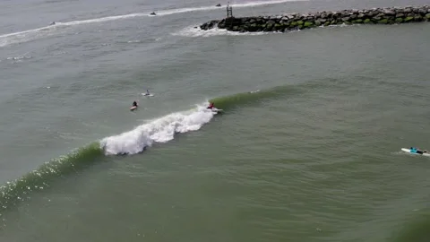 Slow Motion Drone of Surfer during Steel Pier Classic  - Virginia Beach Stock Footage 204757726