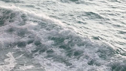 Slow motion drone video of aerial view of and ocean with waves Stock Footage 343480757