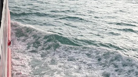 Slow motion drone video of aerial view of and ocean with waves Stock Footage 343480830