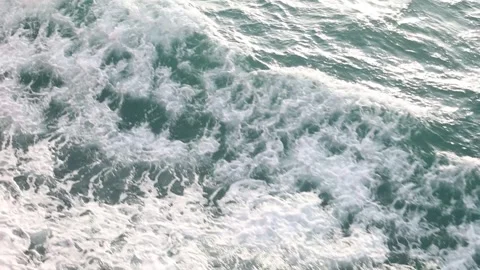 Slow motion drone video of aerial view of the ocean waves splashing Stock Footage 343480836
