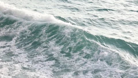 Slow motion drone video of aerial view of and ocean with waves Stock Footage 343820287