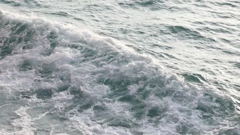 Slow motion drone video of aerial view of and ocean with waves Stock Footage 343820291