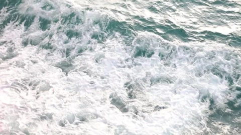 Slow motion drone video of aerial view of and ocean with waves Stock Footage 343820748