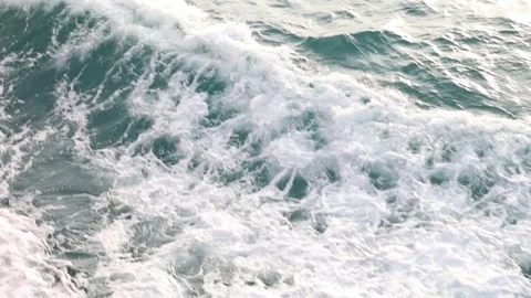 Slow motion drone video of aerial view of the ocean waves splashing Stock Footage 343820764