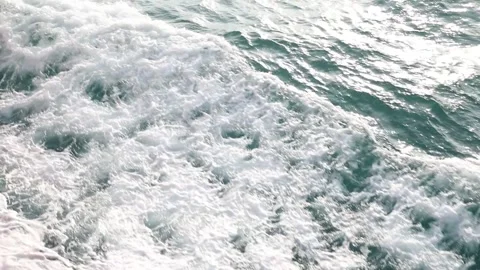 Slow motion drone video of aerial view of the ocean waves splashing Stock Footage 343825412