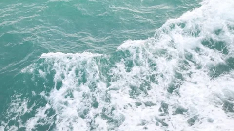 Slow motion drone video of aerial view of and ocean with waves Stock Footage 343832739