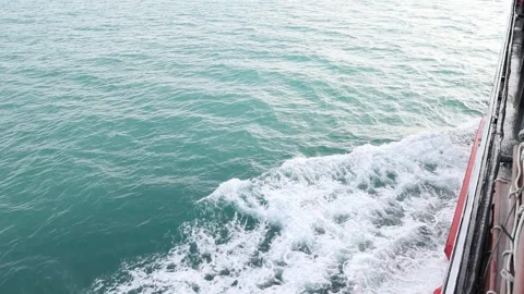 Slow motion drone video of aerial view of the ocean waves splashing Stock Footage 343832762