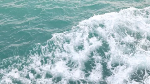 Slow motion drone video of aerial view of the ocean waves splashing Stock Footage 343832787