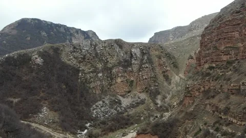 Slow Motion Drone Winter Mountain and Valley with Big Gey Rocky Stones 4 Stock Footage 239858800