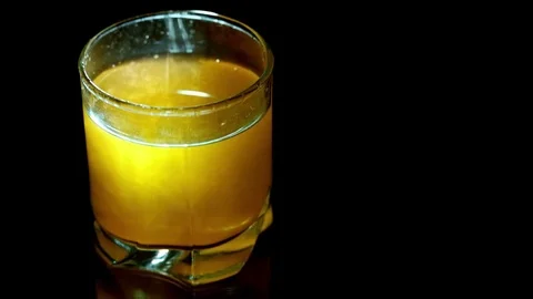 Slow motion drop falling in the cocktail 스톡 동영상 73623159