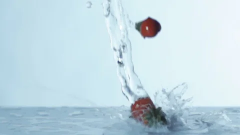 Slow motion dropping Strawberry Video stock 94651069