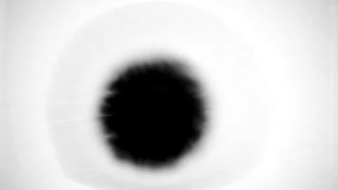 Slow Motion Drops of Ink Stock Footage 74654545