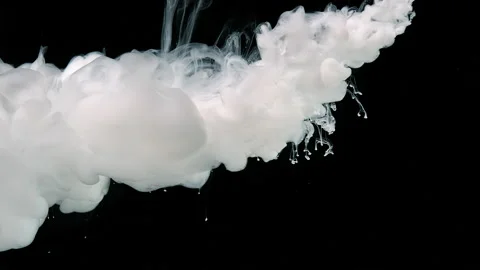 Slow motion of drops of white milky ink in water. White watercolor ink in water Video stock 160672228