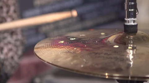 Slow motion of a drum hi-hat playing and being hit by a drumstick Stock Footage 231469760