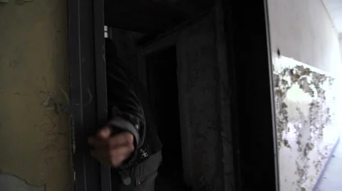 Slow motion of a drunken walking through abandoned building 스톡 동영상 58613541