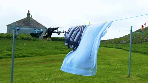 Slow Motion Drying Clothes on the Line, Windy Day, Long Footage (LOOP) Stock Footage 156303672
