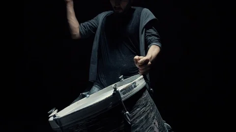 Slow motion dummer. game on a dusty drum close up Stock Footage 98377993