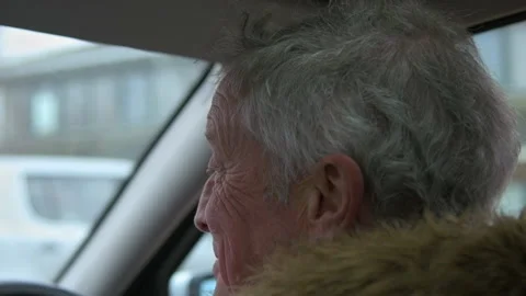 Slow Motion Elderly Man Driving Car Stock Footage 152409705