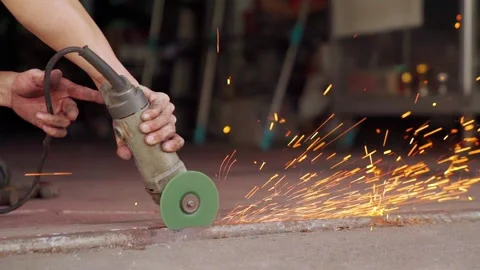 Slow Motion of Electric grinding wheel smooths steel and iron. 스톡 동영상 148609948