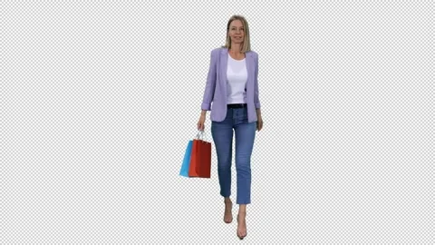 Slow motion of elegant slim mid adult woman walking with colorful shopping bags Video stock 304803930