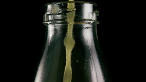 Slow motion. In an empty bottle to pour the juice Stock Footage 75991672